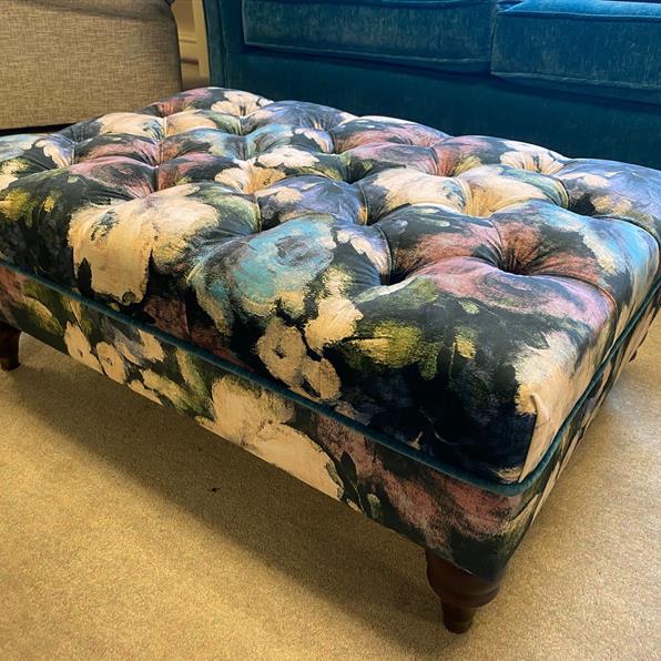 FOOTSTOOL IN FEATURE FABRIC