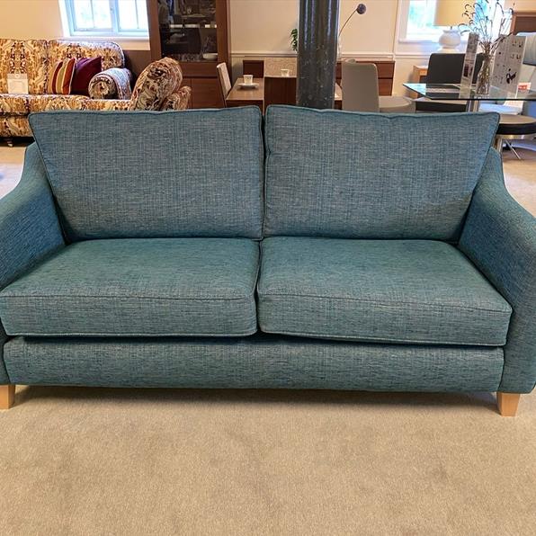 SOFA FRONT VIEW IN TEAL WOVEN FABRIC